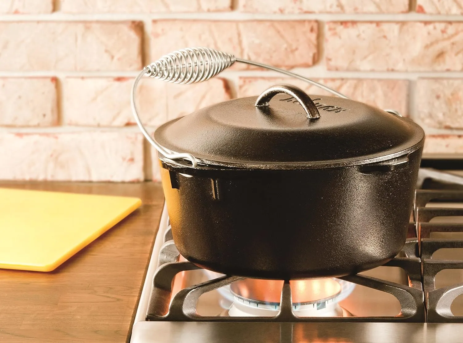 Lodge L8DO3 Cast Iron Dutch Oven (5-Quart) and Lodge 4-in-1 Camp Dutch Oven Tool